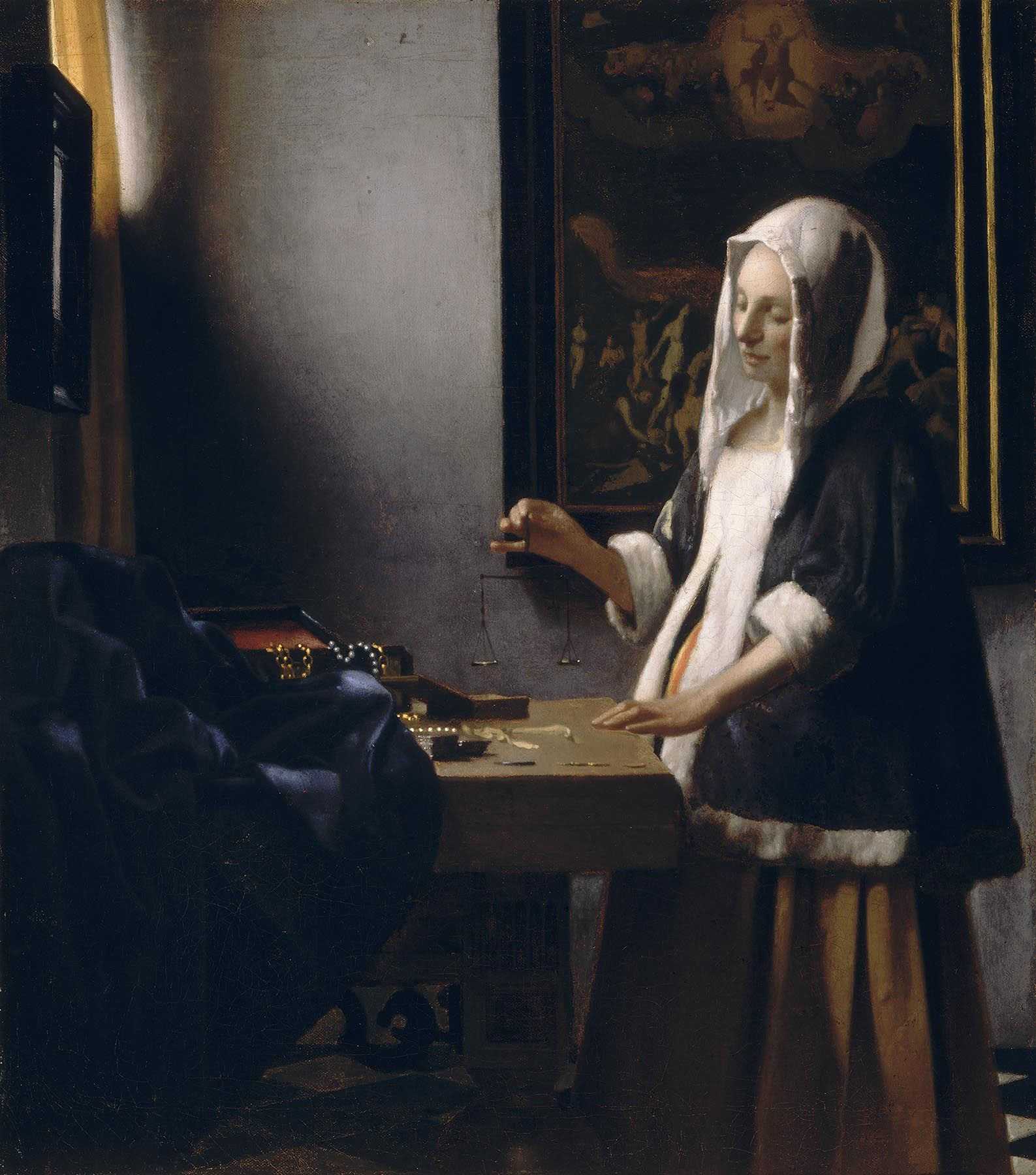 Woman Holding a Balance